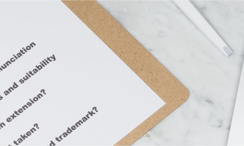The business name is practically always connected to the domain, website, text, and keywords.  business name, keywords, domain registration